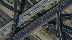 Overhead picture of several busy intersecting highways layered on top one another